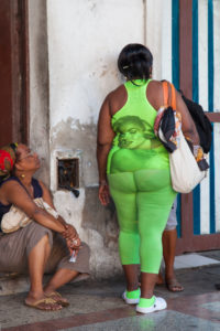 Caribbean, Cuba, Havana, woman in green clothing with 'Marilyn Monroe' print Caribbean, Cuba, Havana, woman in green clothing with 'Marilyn Monroe' print